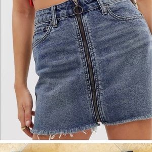 Free People “We The Free” denim zip front mini skirt